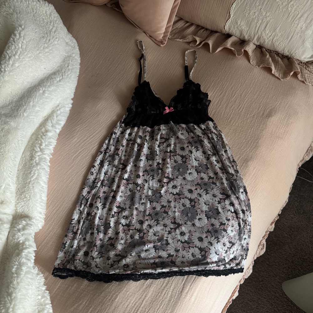 Victoria Secret’s black laced and white, pink and purple floral night slip